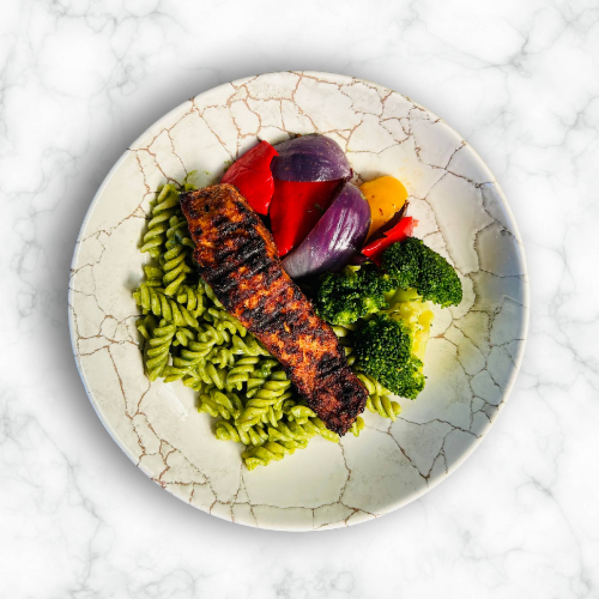 Cajun Salmon, Pesto Pasta, Roast Peppers and Onions and Broccoli