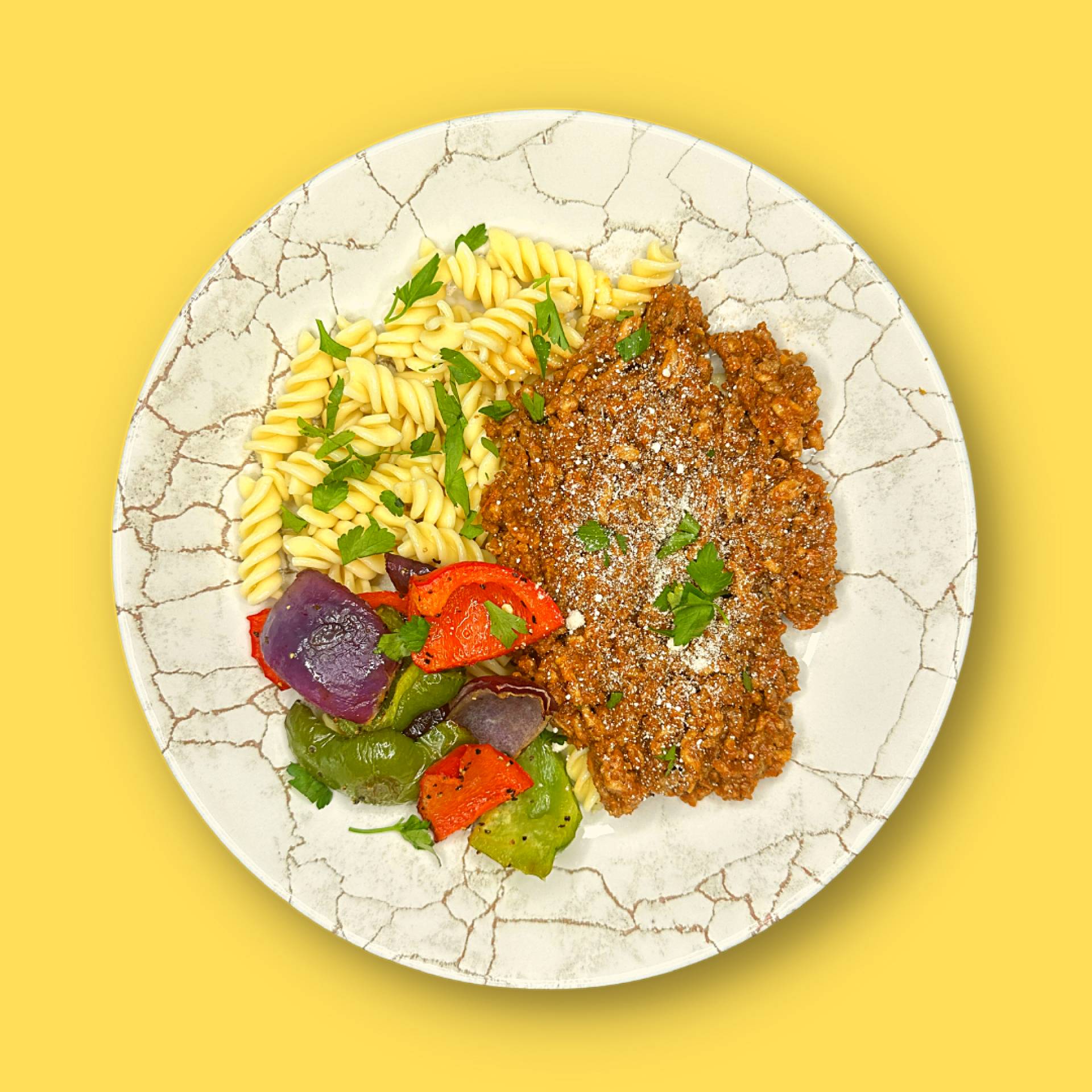 BOLOGNESE, FUSILLI PASTA, ROAST PEPPERS AND ONIONS